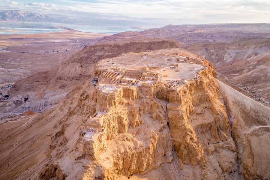 From Tel Aviv: Masada, Ein Gedi & Dead Sea Tour - Entering Masada: cable car, guided orientation, and the summit views
