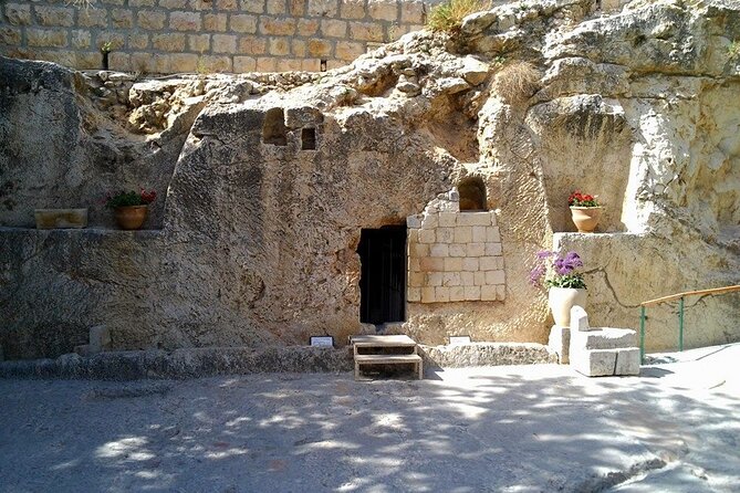In The Footsteps of Jesus Day Tour - Dguide Self Guiding App - Via Dolorosa markers near the Austrian Hospice: a break you can actually use