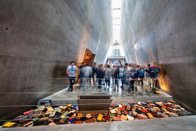 Jerusalem Yad Vashem Holocaust History Museum Tour - Survivor testimonies and propaganda context, side by side