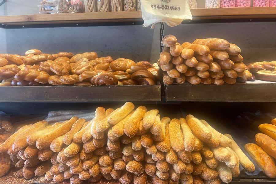 Tel Aviv: Carmel Market & Neighborhood Guided Walking Tour - The Immigrant Food Angle: Malawach, Sabich, and Daily Life